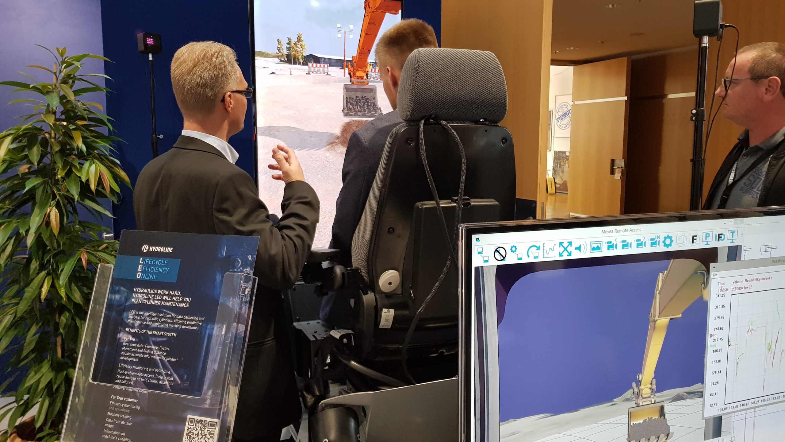 Visitors at Mevea stand in Bauma 2022 fair.