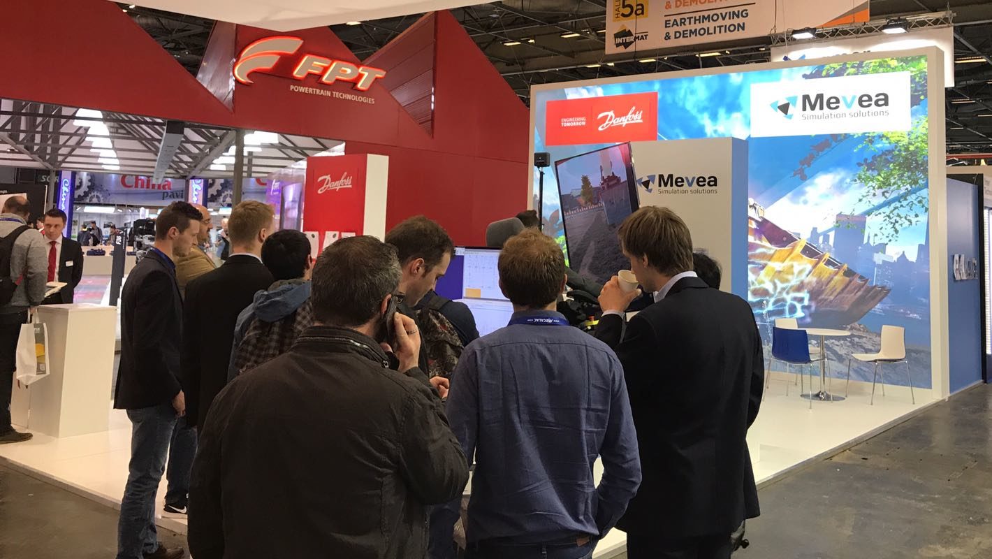 Visitors at the Mevea stand in Intermat 2018 exhibition.