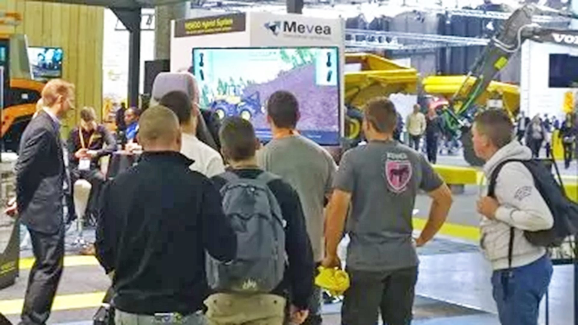 Visitors at the Mevea stand during Intermat Paris exhibition on April 20th-25th, 2015.